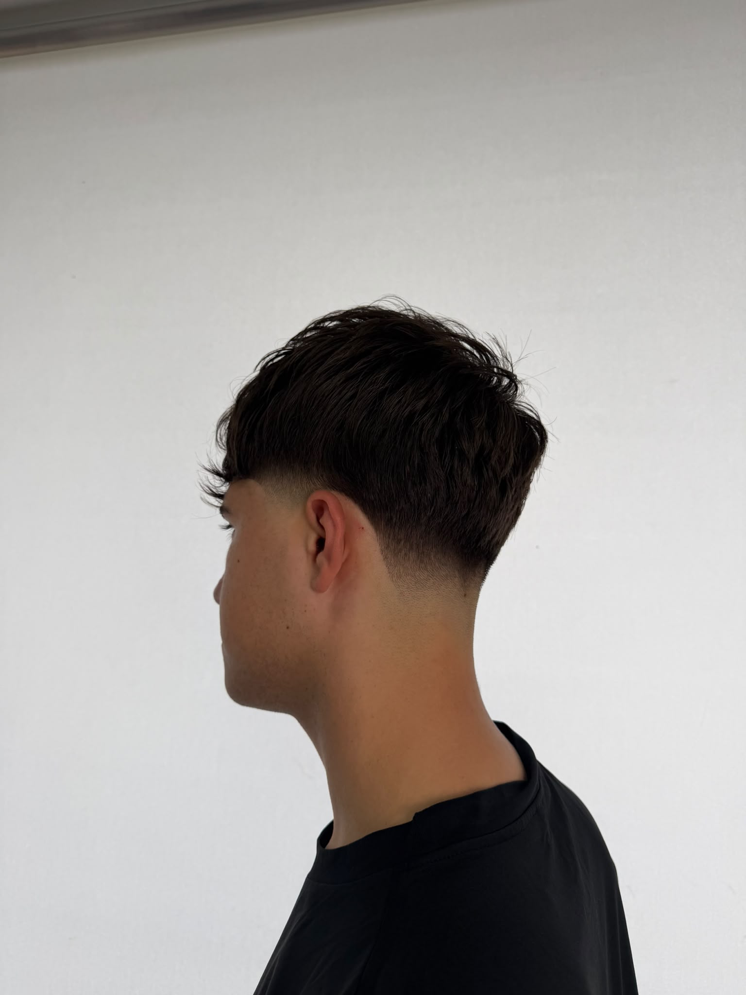 Corte fade y peinado en Academy Rafa Vargas Barberia Santander 10